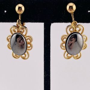 Vintage hematite filigree clip on earrings gold tone